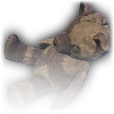 A faded brown Stuffed Bear.